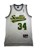 White basketball jersey with 'Seattle Sonics' and number '34' 