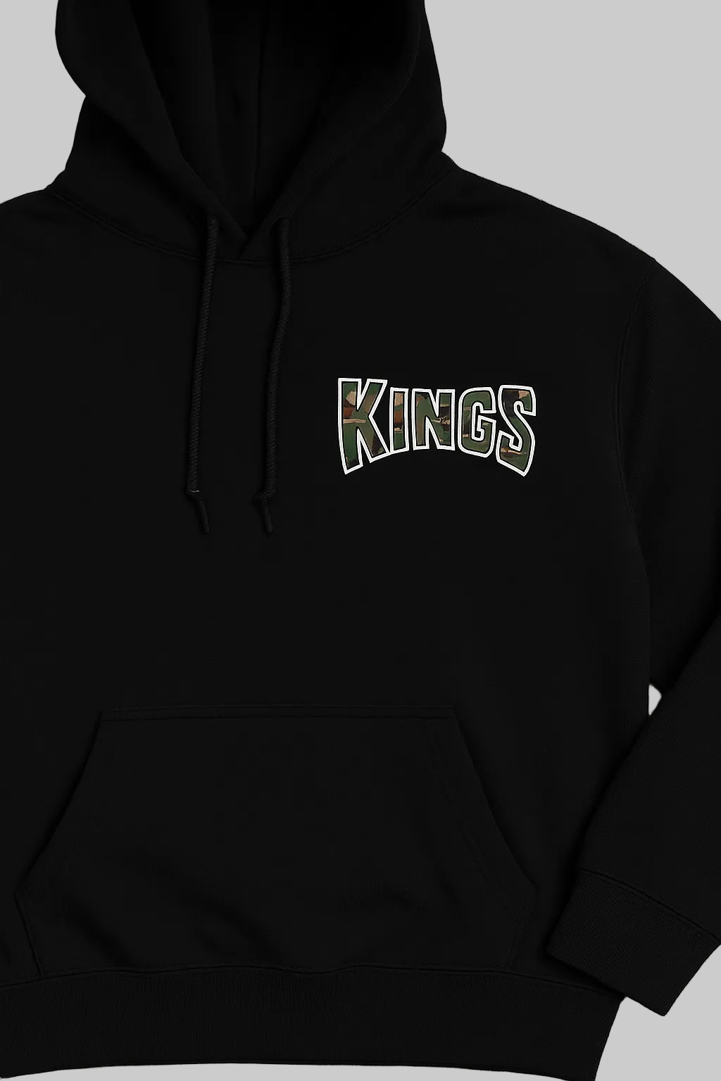 Black hoodie with 'KINGS' text on a beige background